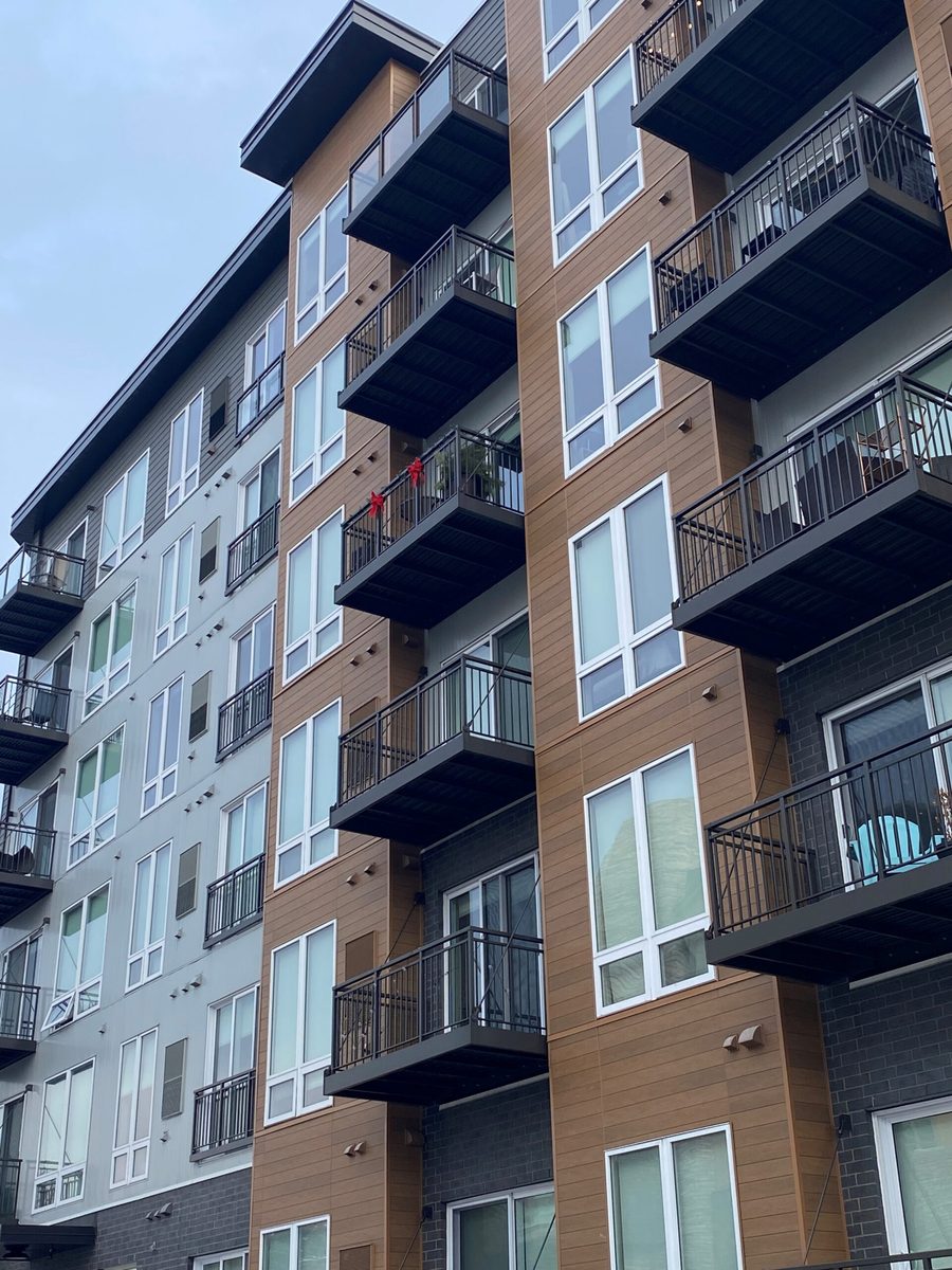 Prefabricated aluminum balconies on multifamily apartment building